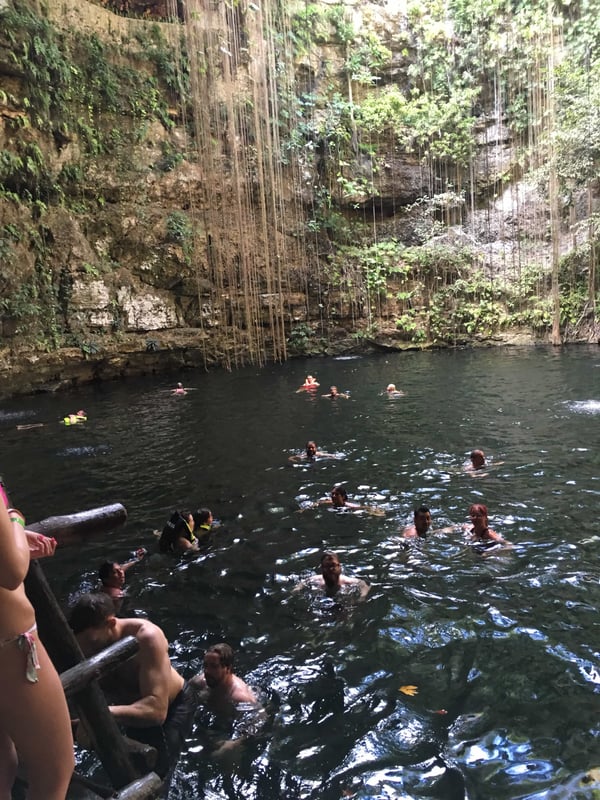 Swimming in Sacred Cenote, Chichen Itza, Yucatán, Mexico