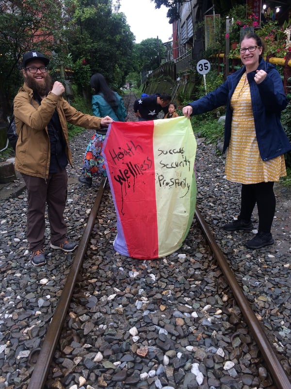 Lighting and launching a lantern, Shifen, Taiwan