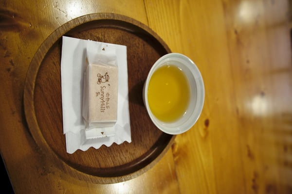 Enjoying Sunny Hills pineapple cake and tea at Pier2 Art Center, Kaohsiung, Taiwan