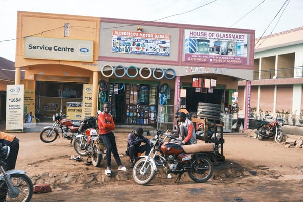 People hanging out in front of stores, Uganda