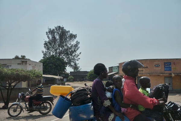 A family of five on a motorcycle, Uganda