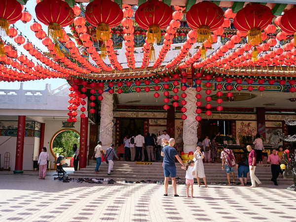 Thean Hou Temple, lanterns and shadows with people zoomed in, Kuala Lumpur, Malaysia