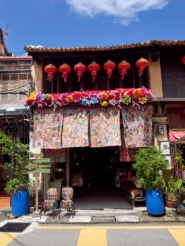 Colorful storefront with lanterns, Penang, Malaysia