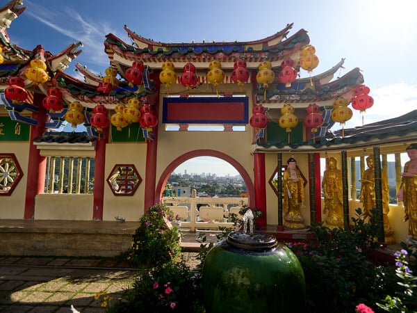 Cityscape through temple architecture, Kek Lok Si Temple, Penang, Malaysia