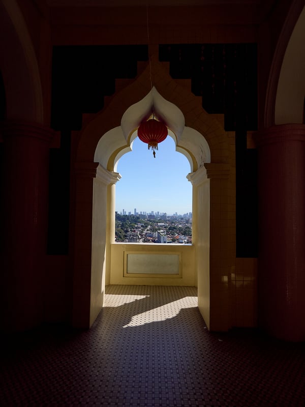 Cityscape through pagoda arch, Kek Lok Si Temple, Penang, Malaysia