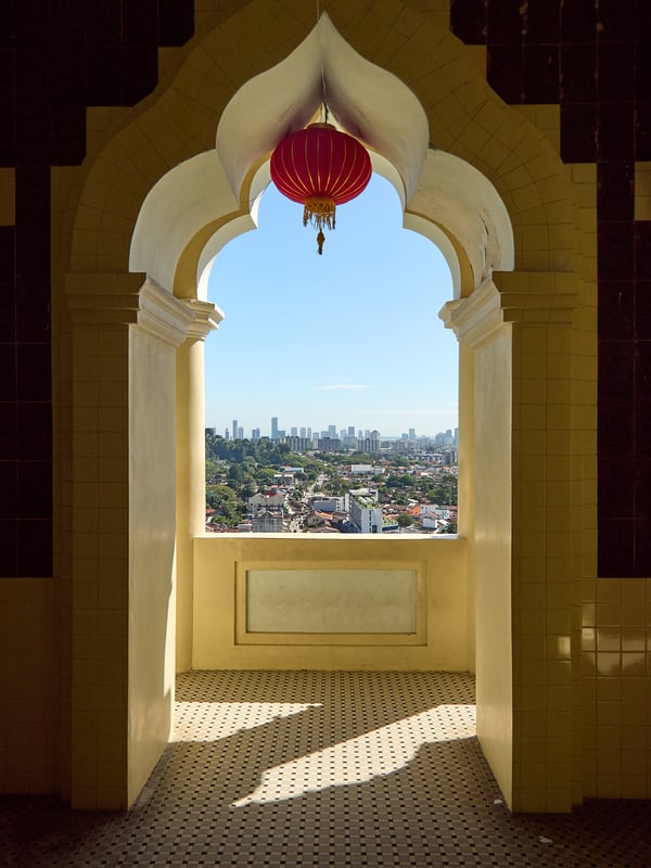 Cityscape through pagoda arch, Kek Lok Si Temple, Penang, Malaysia