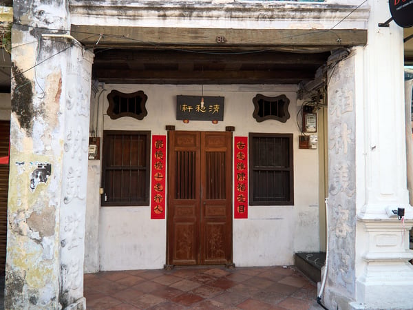 White and red house front, Penang, Malaysia