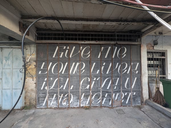Give me your liver, I'll give you my heart street art, Penang, Malaysia