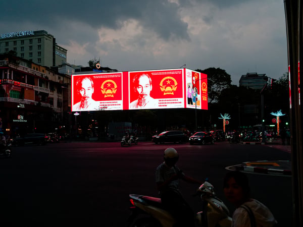 Uncle Ho on an LED billboard, Ho Chi Min City, Vietnam