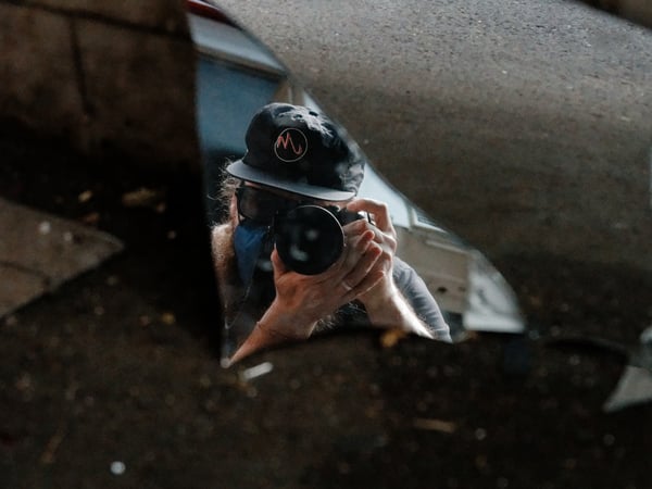 Reflection in broken mirror, alley way near laundry service, Ho Chi Min City, Vietnam